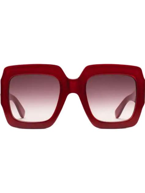 red frame Gucci sunglasses